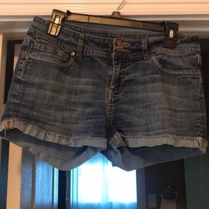 Dark semi-distressed denim shorts